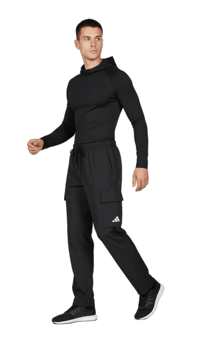Adidas men’s black cargo jogger pants with side pockets and white logo, paired with black sneakers, athletic casual wear